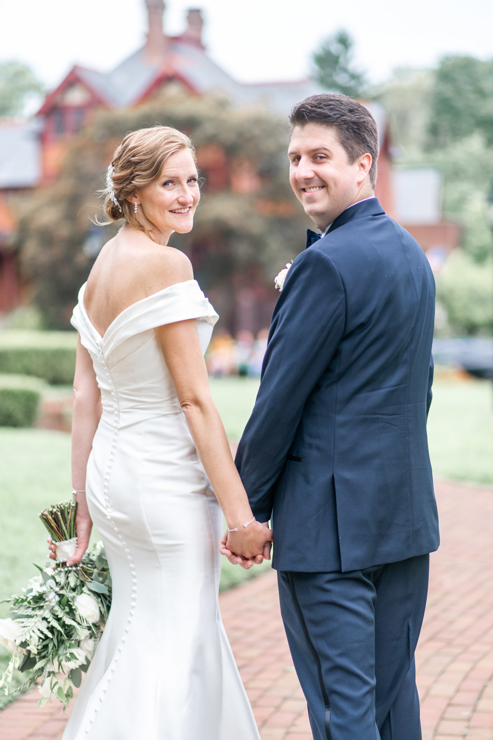 Leslie and Dorian posing after their wedding in Annapolis at St. Mary's Church